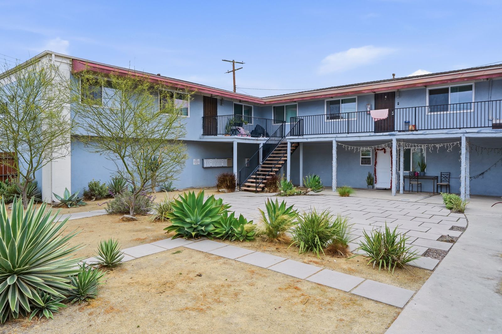 Courtyard with desert landscaping and stairway